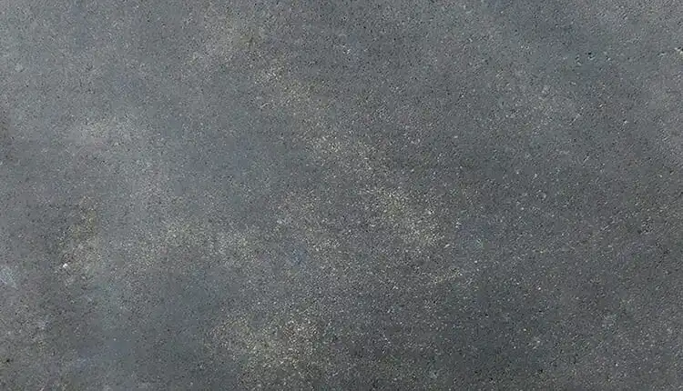 A close up of the surface of a concrete floor.